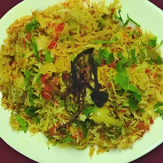 56. Vegetable Biryani.